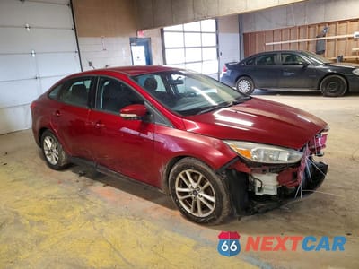 Czwarte zdjęcie samochodu z boku: 2016 FORD FOCUS SE VIN:1FADP3F24GL327720 - miniatura