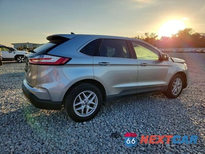 Trzecie zdjęcie samochodu z tyłu: 2021 FORD EDGE SEL VIN:2FMPK3J92MBA11511 - miniatura