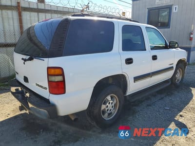 Trzecie zdjęcie samochodu z tyłu: 2003 CHEVROLET TAHOE C1500 VIN:1GNEC13T83R177685 - miniatura