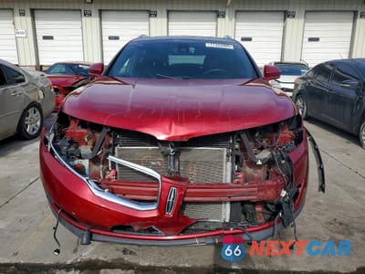 Piąte zdjęcie samochodu w środku: 2016 LINCOLN MKX RESERVE VIN:2LMTJ8LR6GBL51815 - miniatura