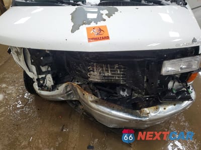 Zdjęcie 12 z 13 samochodu: 1998 CHEVROLET EXPRESS G1500 VIN:1GBFG15R3W1006417 - miniatura