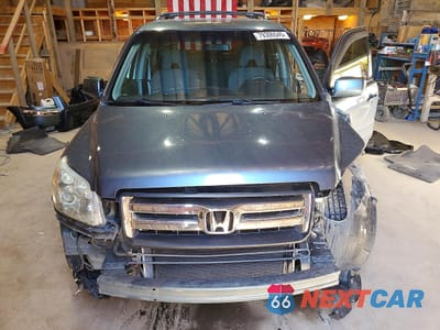 Piąte zdjęcie samochodu w środku: 2006 HONDA PILOT EX VIN:2HKYF18436H521109 - miniatura