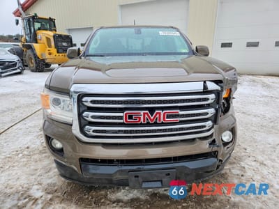 Piąte zdjęcie samochodu w środku: 2016 GMC CANYON SLE VIN:1GTH6CEA2G1145727 - miniatura