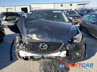 Piąte zdjęcie samochodu w środku: 2015 MAZDA 5 SE VIN:JM3KE4DY3F0458004 - miniatura