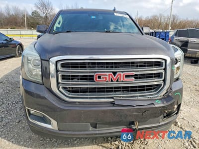 Piąte zdjęcie samochodu w środku: 2016 GMC YUKON SLT VIN:1GKS1BKC6GR257649 - miniatura