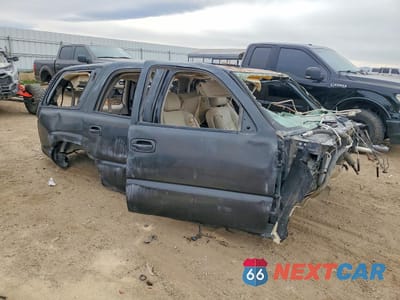 Czwarte zdjęcie samochodu z boku: 2005 CHEVROLET TAHOE C1500 VIN:1GNEC13T85R167936 - miniatura