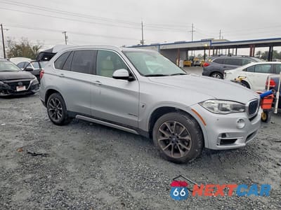 Czwarte zdjęcie samochodu z boku: 2018 BMW X5 XDR40E VIN:5UXKT0C58J0W01051 - miniatura