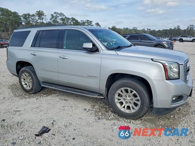 Czwarte zdjęcie samochodu z boku: 2018 GMC YUKON SLT VIN:1GKS2BKC2JR272010 - miniatura