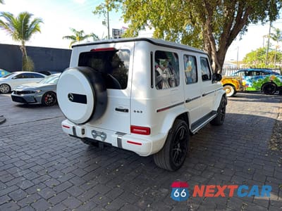 Czwarte zdjęcie samochodu z boku: 2024 MERCEDES-BENZ G 63 AMG VIN:W1NYC7HJ0RX495684 - miniatura