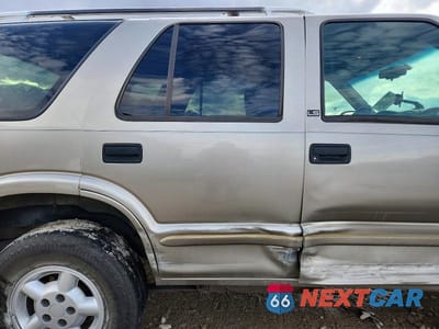 Zdjęcie 10 z 12 samochodu: 2003 CHEVROLET BLAZER VIN:1GNDT13XX3K146283 - miniatura