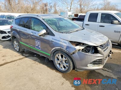 Czwarte zdjęcie samochodu z boku: 2016 FORD ESCAPE TITANIUM VIN:1FMCU0JX7GUB90861 - miniatura