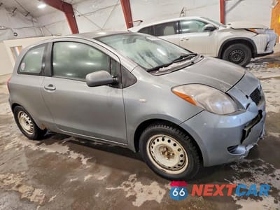 Czwarte zdjęcie samochodu z boku: 2007 TOYOTA YARIS VIN:JTDJT923185211309 - miniatura