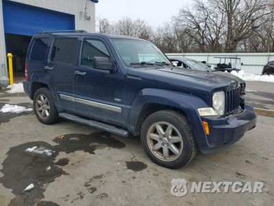 Czwarte zdjęcie samochodu z boku: 2012 JEEP LIBERTY SPORT VIN:1C4PJMAK7CW185393 - miniatura