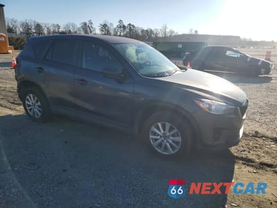 Czwarte zdjęcie samochodu z boku: 2014 MAZDA CX-5 TOURING VIN:JM3KE2CY2E0319924 - miniatura