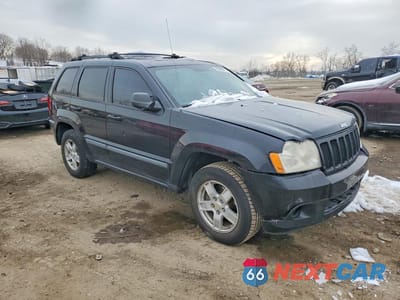 Czwarte zdjęcie samochodu z boku: 2007 JEEP GRAND CHEROKEE LAREDO VIN:1J8GS48K07C595102 - miniatura