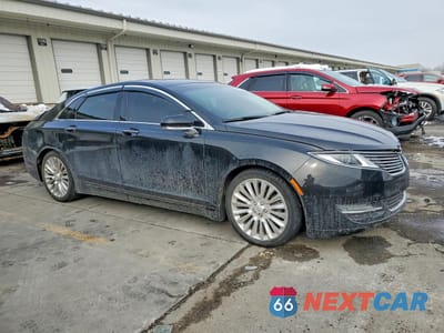 Czwarte zdjęcie samochodu z boku: 2015 LINCOLN MKZ VIN:3LN6L2G92FR610701 - miniatura