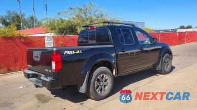 Czwarte zdjęcie samochodu z boku: 2014 NISSAN FRONTIER PRO-4X VIN:1N6AD0EV1EN738359 - miniatura