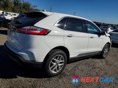 Trzecie zdjęcie samochodu z tyłu: 2024 FORD EDGE SEL VIN:2FMPK4J9XRBA50778 - miniatura