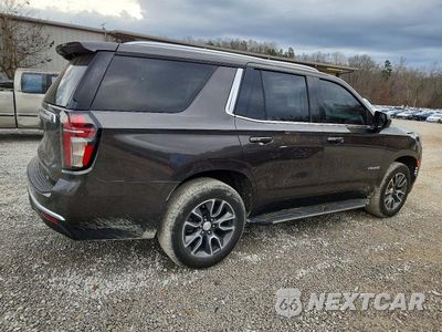 Trzecie zdjęcie samochodu z tyłu: 2021 CHEVROLET TAHOE C1500 LT VIN:1GNSCNKD8MR408333 - miniatura