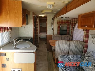 Zdjęcie 6 z 10 samochodu: 2004 FORD F550 SUPER DUTY RV VIN:1F6NF53SX40A10266 - miniatura