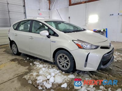 Czwarte zdjęcie samochodu z boku: 2015 TOYOTA PRIUS V VIN:JTDZN3EU0FJ024615 - miniatura