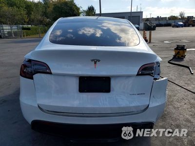 Zdjęcie 6 z 11 samochodu: 2023 TESLA MODEL Y VIN:7SAYGDEE5PF771191 - miniatura