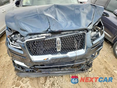 Zdjęcie 12 z 14 samochodu: 2021 LINCOLN NAVIGATOR BLACK LABEL VIN:5LMJJ2TT1MEL15636 - miniatura