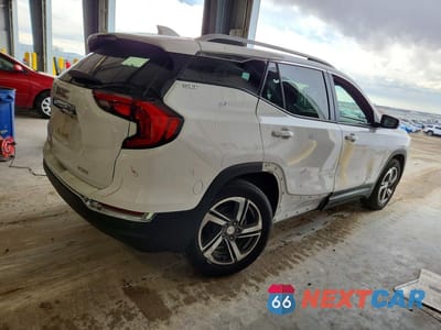 Trzecie zdjęcie samochodu z tyłu: 2020 GMC TERRAIN SLT VIN:3GKALVEV4LL141100 - miniatura
