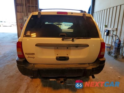 Zdjęcie 6 z 13 samochodu: 1999 JEEP GRAND CHEROKEE LAREDO VIN:1J4GW58S6XC508704 - miniatura