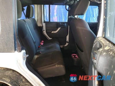 Zdjęcie 11 z 12 samochodu: 2015 JEEP WRANGLER UNLIMITED RUBICON VIN:1C4BJWFG2FL504022 - miniatura