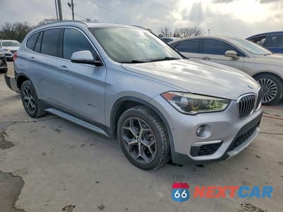 Czwarte zdjęcie samochodu z boku: 2017 BMW X1 SDRIVE28I VIN:WBXHU7C35H5H38340 - miniatura