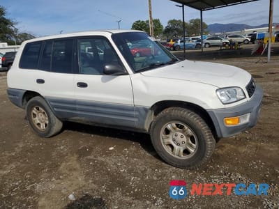 Czwarte zdjęcie samochodu z boku: 1998 TOYOTA RAV4 VIN:JT3GP10V6W0023324 - miniatura