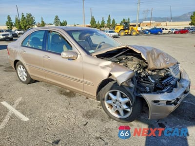 Czwarte zdjęcie samochodu z boku: 2002 MERCEDES-BENZ C 320 VIN:WDBRF64JX2F183384 - miniatura