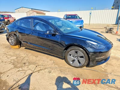 Czwarte zdjęcie samochodu z boku: 2023 TESLA MODEL 3 VIN:5YJ3E1EAXPF382569 - miniatura