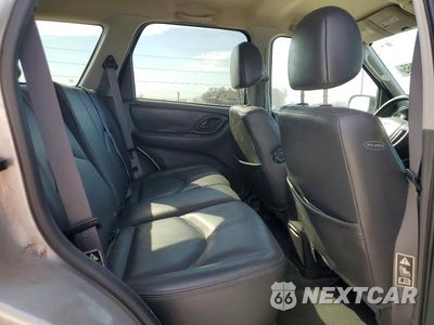 Zdjęcie 11 z 13 samochodu: 2003 MAZDA TRIBUTE VIN:4F2CZ06103KM32258 - miniatura