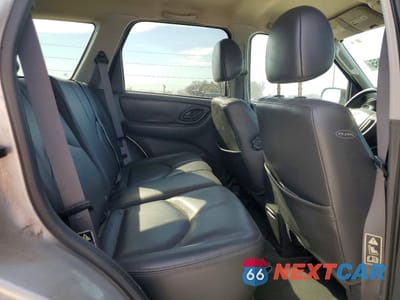 Zdjęcie 11 z 13 samochodu: 2003 MAZDA TRIBUTE VIN:4F2CZ06103KM32258 - miniatura