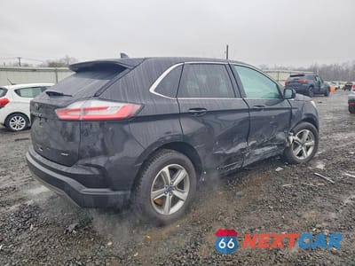 Trzecie zdjęcie samochodu z tyłu: 2022 FORD EDGE SEL VIN:2FMPK4J91NBA59332 - miniatura