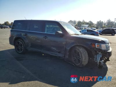 Czwarte zdjęcie samochodu z boku: 2014 FORD FLEX SEL VIN:2FMGK5C89EBD23343 - miniatura