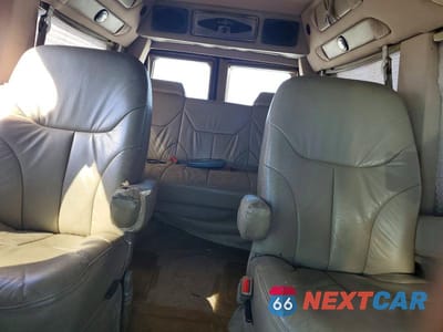 Zdjęcie 10 z 13 samochodu: 2003 FORD ECONOLINE E150 VAN VIN:1FDRE14W23HB84775 - miniatura