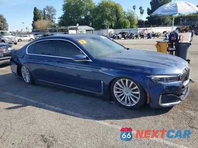 Czwarte zdjęcie samochodu z boku: 2022 BMW 740 I VIN:WBA7T2C06NCH58234 - miniatura