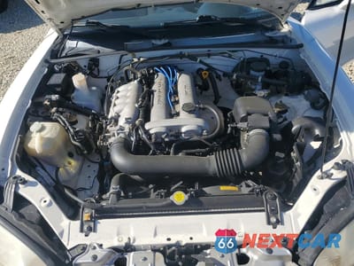 Zdjęcie 11 z 12 samochodu: 1999 MAZDA MX-5 MIATA VIN:JM1NB3530X0113851 - miniatura