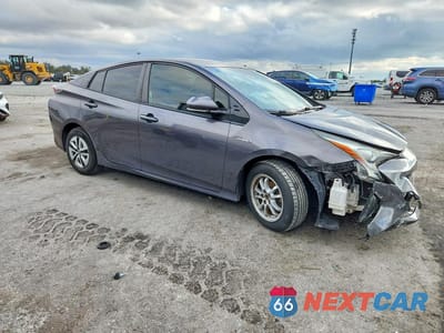 Czwarte zdjęcie samochodu z boku: 2018 TOYOTA PRIUS THREE VIN:JTDKARFU0J3550710 - miniatura