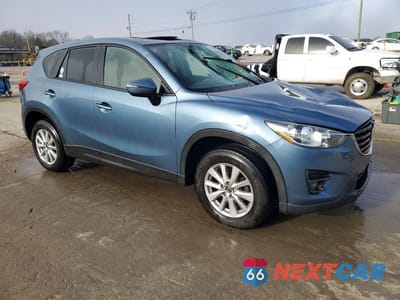 Czwarte zdjęcie samochodu z boku: 2016 MAZDA CX-5 TOURING VIN:JM3KE2CYXG0860917 - miniatura
