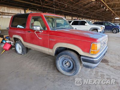 Czwarte zdjęcie samochodu z boku: 1990 FORD BRONCO II VIN:1FMCU12T1LUA11502 - miniatura
