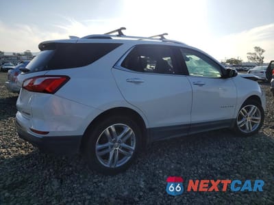 Trzecie zdjęcie samochodu z tyłu: 2018 CHEVROLET EQUINOX PREMIER VIN:2GNAXWEX9J6222478 - miniatura