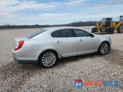 Trzecie zdjęcie samochodu z tyłu: 2013 LINCOLN MKS VIN:1LNHL9DK4DG602614 - miniatura