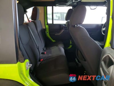 Zdjęcie 11 z 13 samochodu: 2013 JEEP WRANGLER UNLIMITED SPORT VIN:1C4BJWDG0DL511776 - miniatura