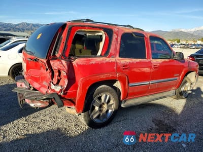 Trzecie zdjęcie samochodu z tyłu: 2001 GMC YUKON K1500 VIN:1GKEC13T61J192744 - miniatura