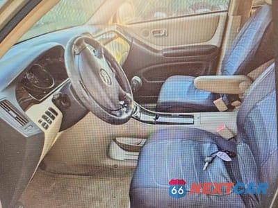 Zdjęcie 7 z 12 samochodu: 2003 TOYOTA HIGHLANDER LIMITED VIN:JTEGF21A130121541 - miniatura