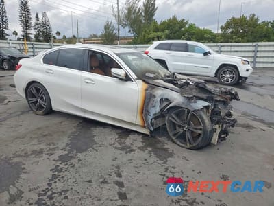 Czwarte zdjęcie samochodu z boku: 2021 BMW 330I VIN:3MW5R1J06M8B66645 - miniatura